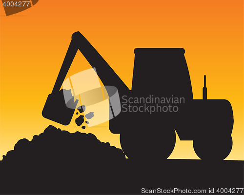 Image of Silhouette of the excavator digging ground