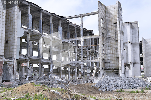 Image of Pieces of Metal and Stone are Crumbling from Demolished Building Floors