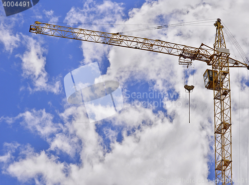 Image of  Construction site with cranes on sky background