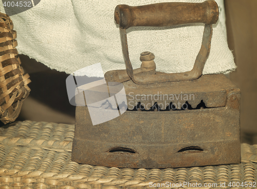 Image of Vintage cast iron iron.
