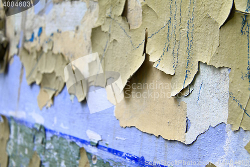 Image of Old paint peeling from wall