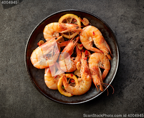 Image of fried prawns on black plate