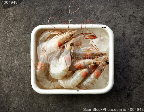 Image of fresh raw prawns in metallic bowl