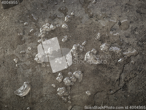 Image of iced water on dark gray table top