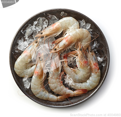 Image of fresh raw prawns on black plate