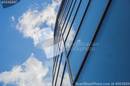 Image of window reflection dayligh as blue background