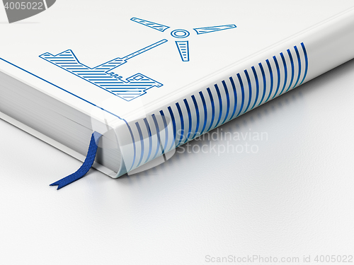 Image of Industry concept: closed book, Windmill on white background