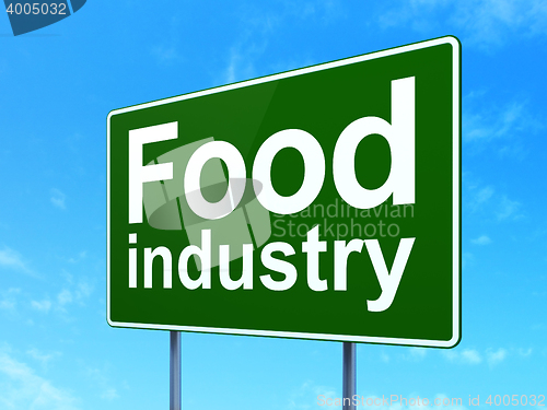 Image of Manufacuring concept: Food Industry on road sign background