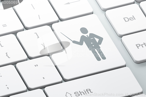 Image of Education concept: Teacher on computer keyboard background