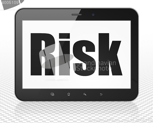 Image of Finance concept: Tablet Pc Computer with Risk on display