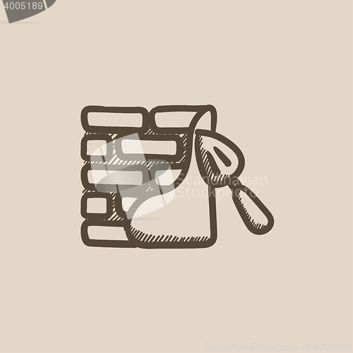 Image of Spatula with brickwall sketch icon.