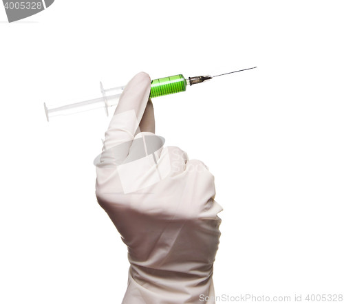 Image of Hand holding syringe isolated on white