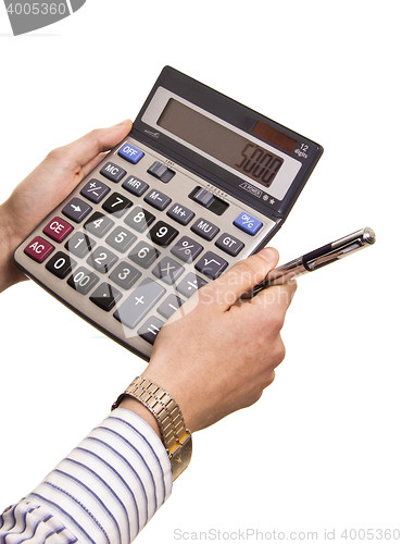 Image of Male businessman using a calculator