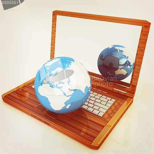 Image of Eco Wooden Laptop and Earth. 3D illustration. Vintage style.