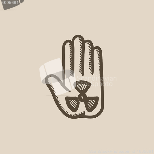 Image of Ionizing radiation sign on a palm sketch icon.