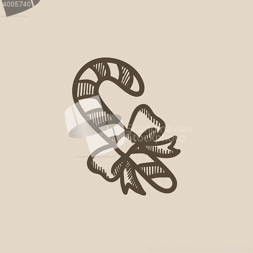 Image of Candy cane with christmas decoration sketch icon.