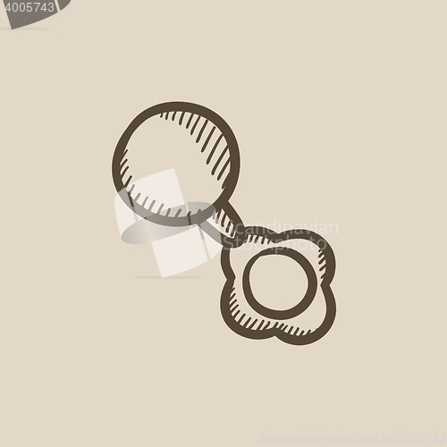 Image of Baby rattle sketch icon.