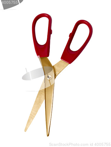 Image of golden scissors isolated
