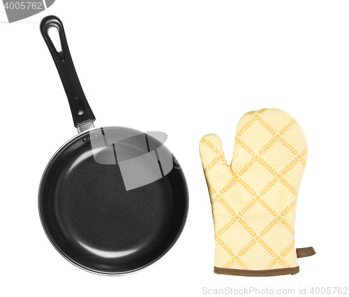 Image of Kitchen glove with pan on a white