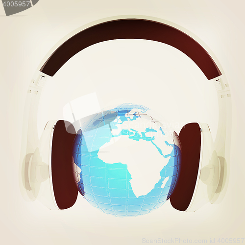 Image of Blue earth with headphones from transparent plastic. World music