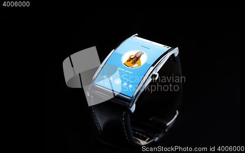 Image of close up of smart watch with music