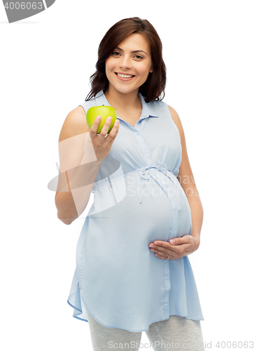 Image of happy pregnant woman holding green apple