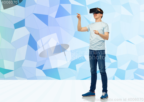 Image of happy man in virtual reality headset or 3d glasses