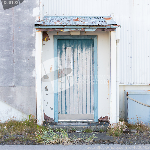 Image of Front view of a boarded-up abandoned building in Iceland