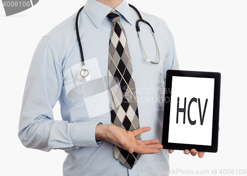 Image of Doctor holding tablet - HCV