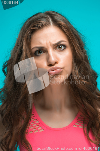 Image of The young woman\'s portrait with thoughtful emotions