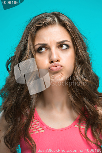 Image of The young woman\'s portrait with thoughtful emotions