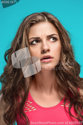 Image of The young woman\'s portrait with thoughtful emotions