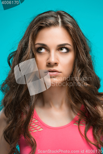 Image of The young woman\'s portrait with thoughtful emotions