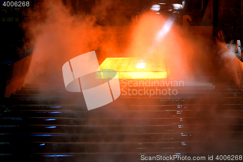 Image of hot steel on conveyor