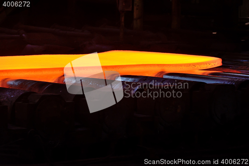 Image of hot steel on conveyor