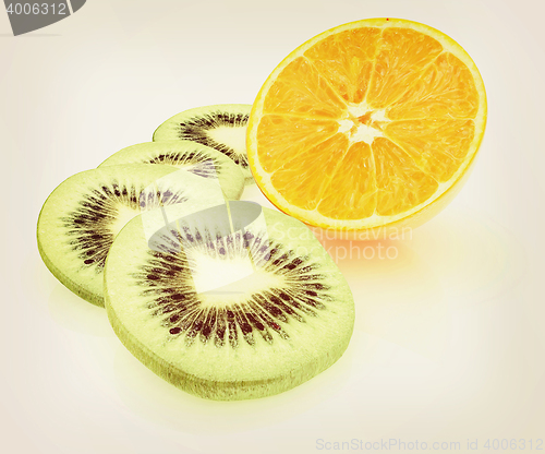 Image of slices of kiwi and half orange. 3D illustration. Vintage style.