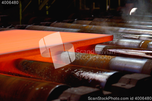 Image of hot plate on conveyor