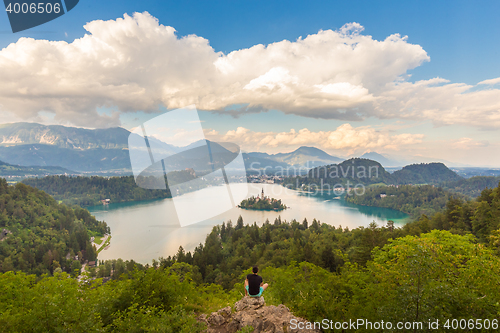 Image of Man enjoying panoramic view of Lake Bled, Slovenia.