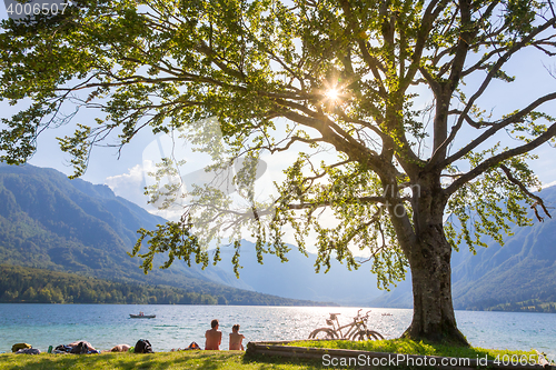 Image of Couple enjoying beautiful nature around lake Bohinj, Slovenia.