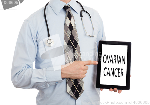 Image of Doctor holding tablet - Ovarian cancer