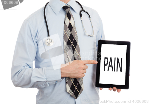 Image of Doctor holding tablet - Pain