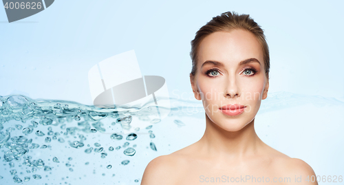 Image of beautiful young woman face over white background