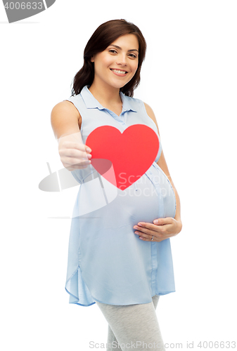 Image of happy pregnant woman with red heart touching belly