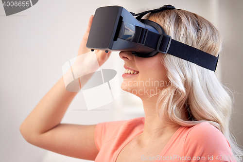 Image of woman in virtual reality headset or 3d glasses