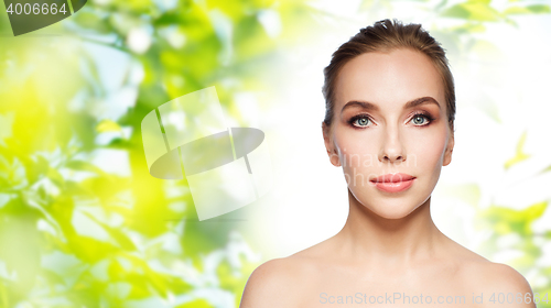 Image of beautiful young woman face over white background
