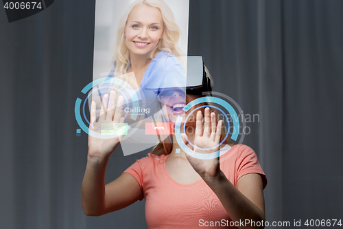 Image of woman in virtual reality headset or 3d glasses