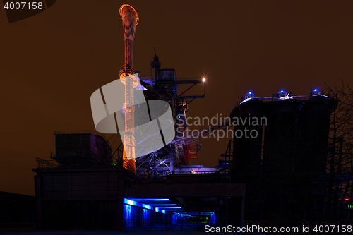 Image of Night shot of Landschaftspark Nord, old illuminated industrial ruins in Duisburg, Germany