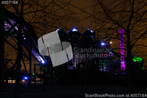 Image of Night shot of Landschaftspark Nord, old illuminated industrial ruins in Duisburg, Germany