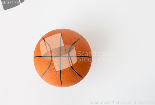 Image of close up of basketball ball over white background