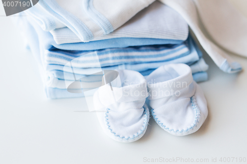 Image of close up of baby boys clothes for newborn on table